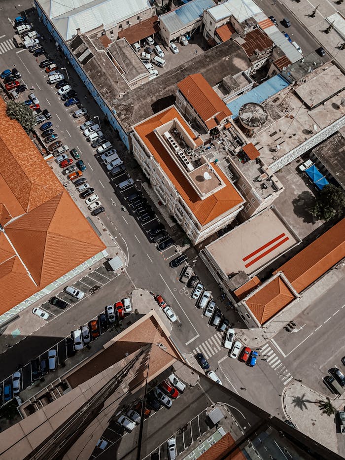 Top-down view of the bustling streets and buildings in Luanda, showcasing vibrant urban life.